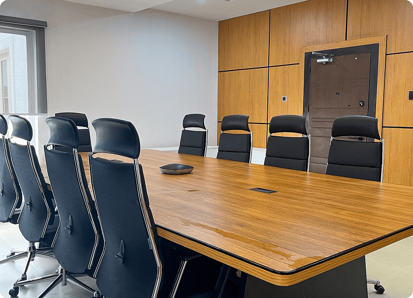 X35-designed executive boardroom with hardwood conference table and wood-panelled feature wall